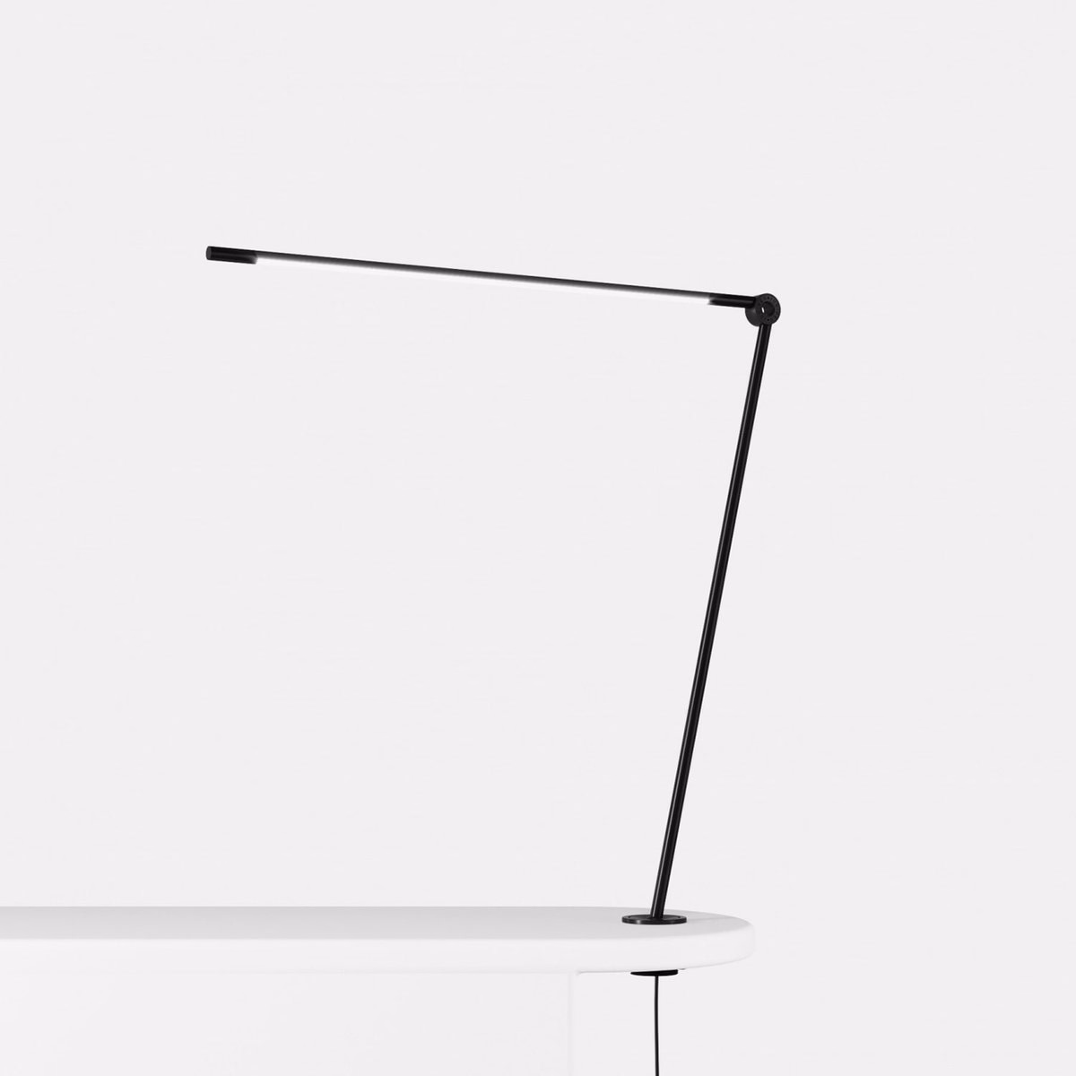 THIN lamp, born of a collaboration between designer Peter Bristol a... - Darius Dan