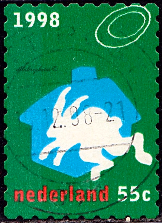 A curated collection of vintage postage stamps from Netherlands, Ni... - brianna
